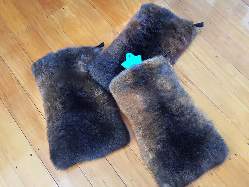 Possum fur hot water bottle cover in many colors with velcro top closure. Also used as a cushion or pyjama holder