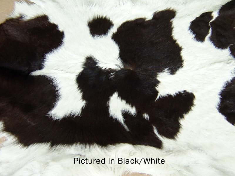 New Zealand Friesian spotted cow skin leather hides in natural and dyed colors. Great for rug or chair cover